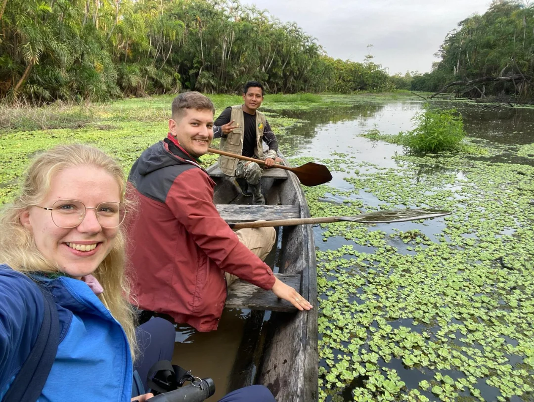 Canoe excursion through an Amazon oxbow lake on a relaxing 4 Day Manu National Park Tour from Cusco