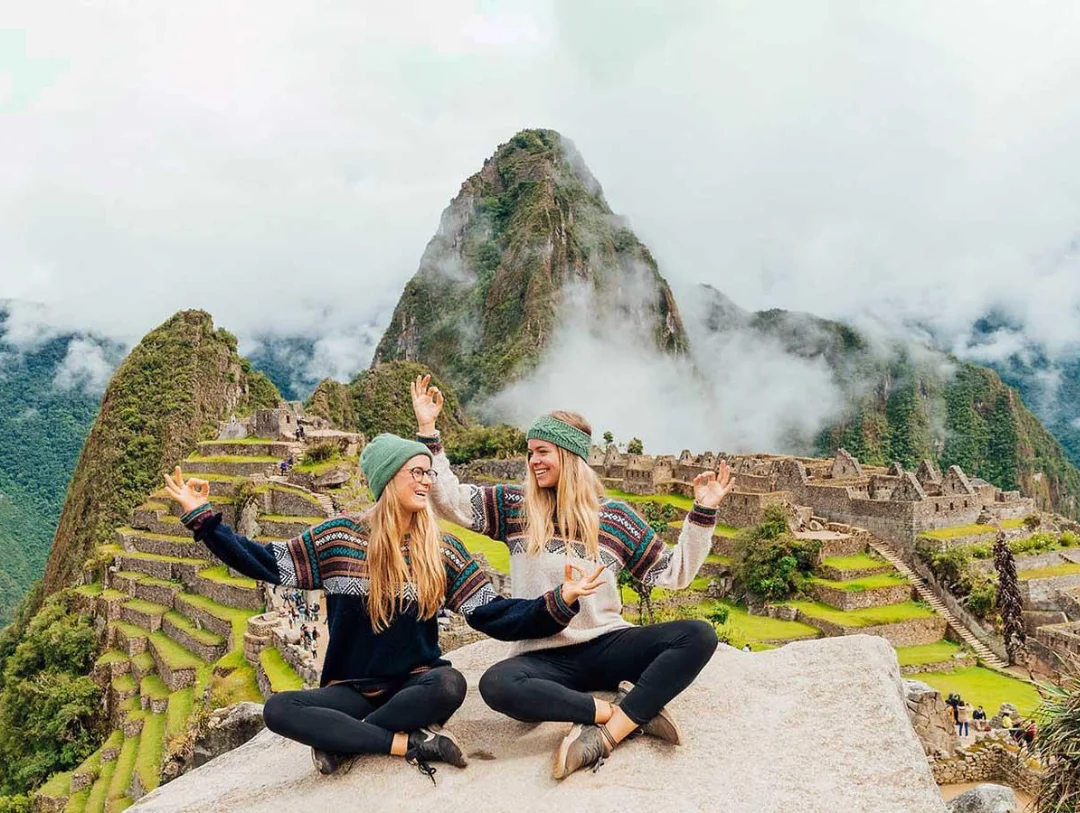 Travelers enjoying Machu Picchu during the 2-Day Machu Picchu Tour by Bus