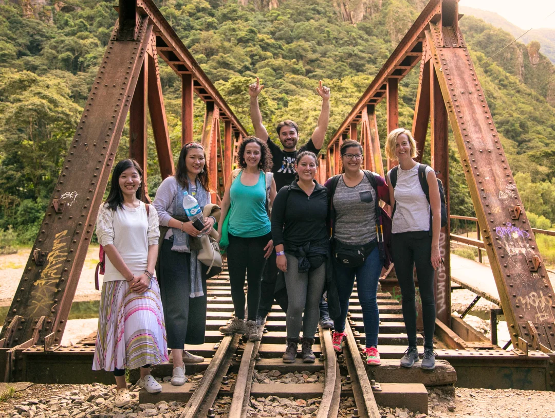 Travelers crossing the Hydroelectric bridge on the way to Machu Picchu