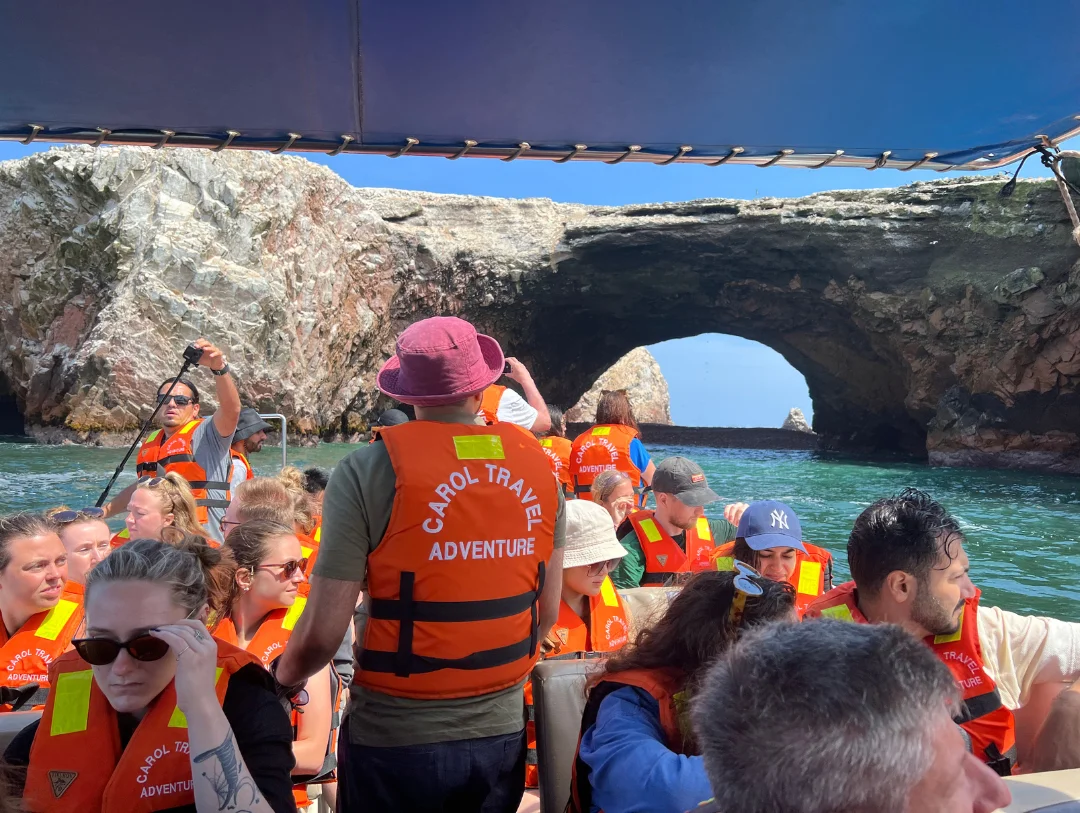 Travelers exploring the Ballestas Islands by speedboat during a Paracas tour from Lima