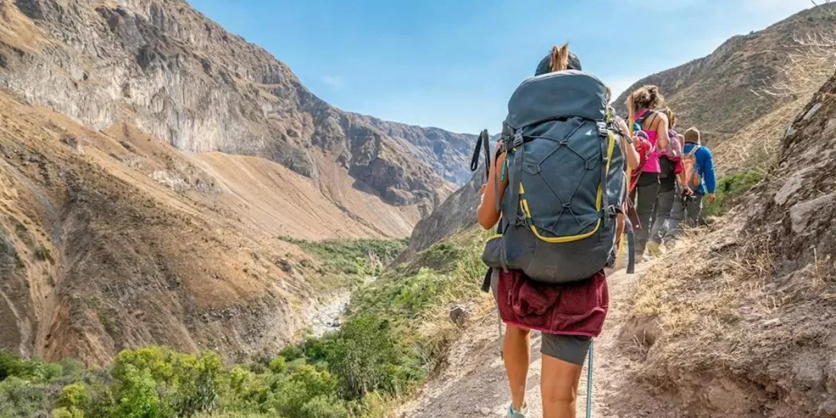 Hikers trekking through the Colca Canyon near Arequipa Peru